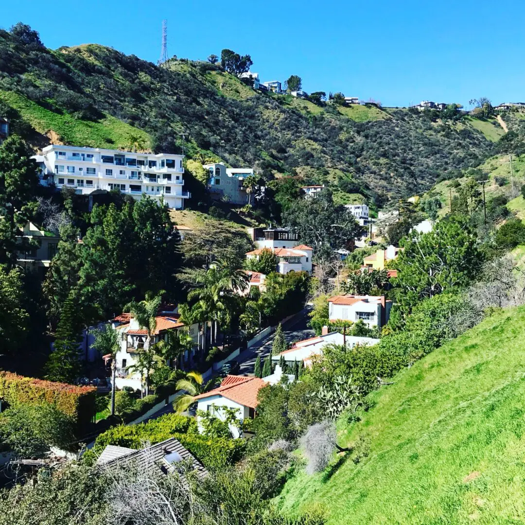 A view of houses on the side of a hill.