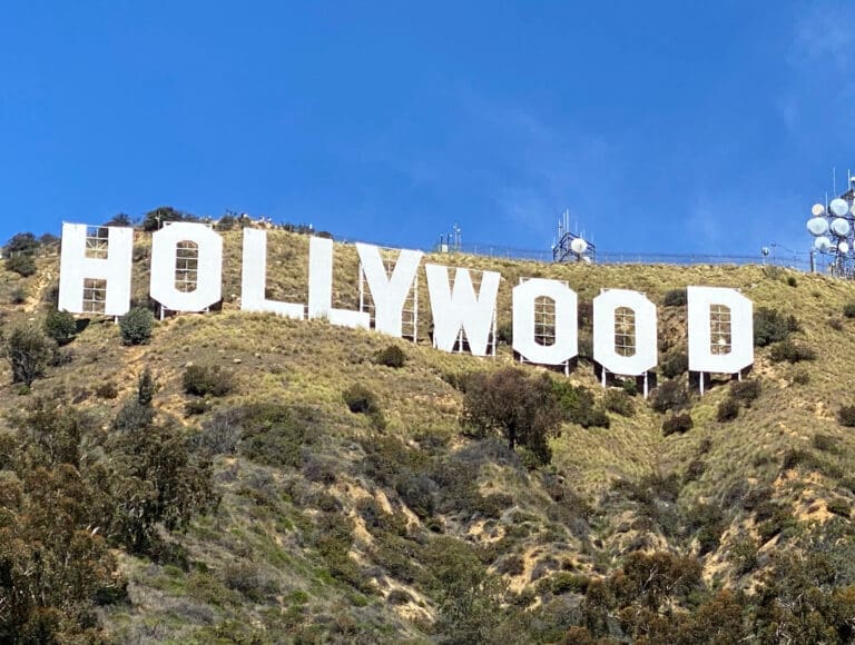 A large sign that says hollywood on the side of a hill.