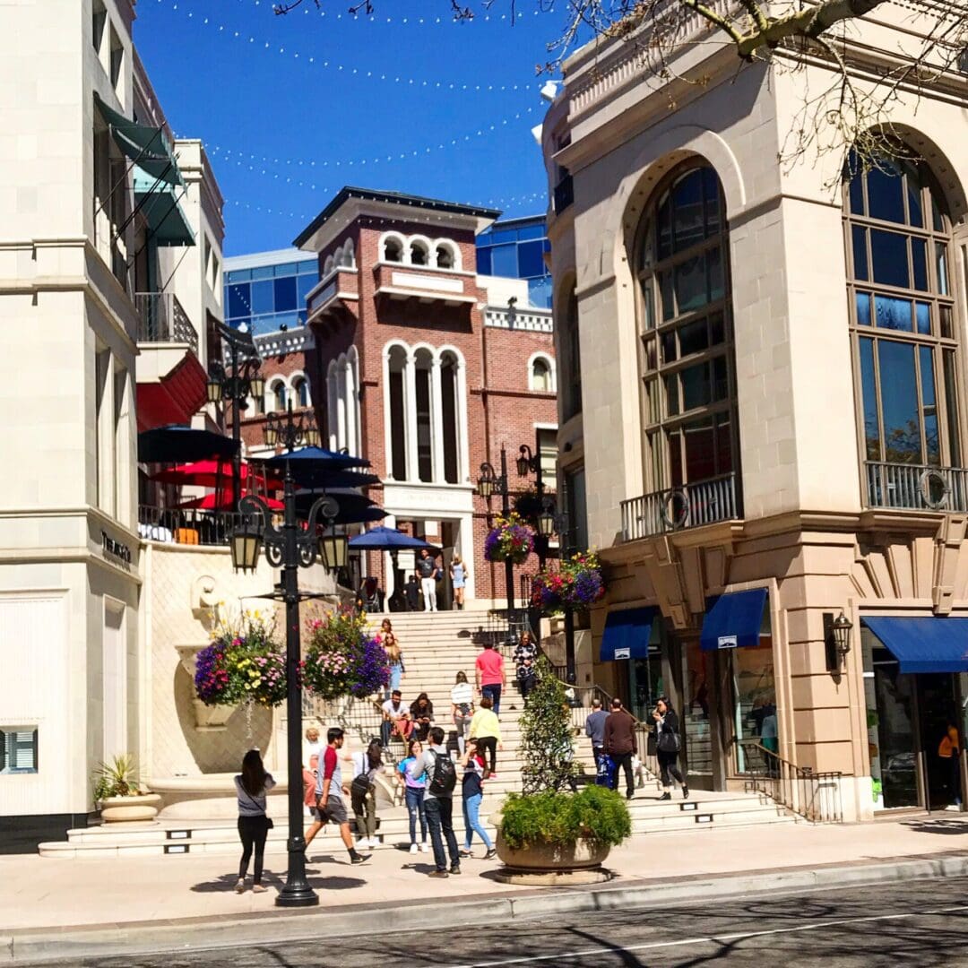 A group of people walking down the street.