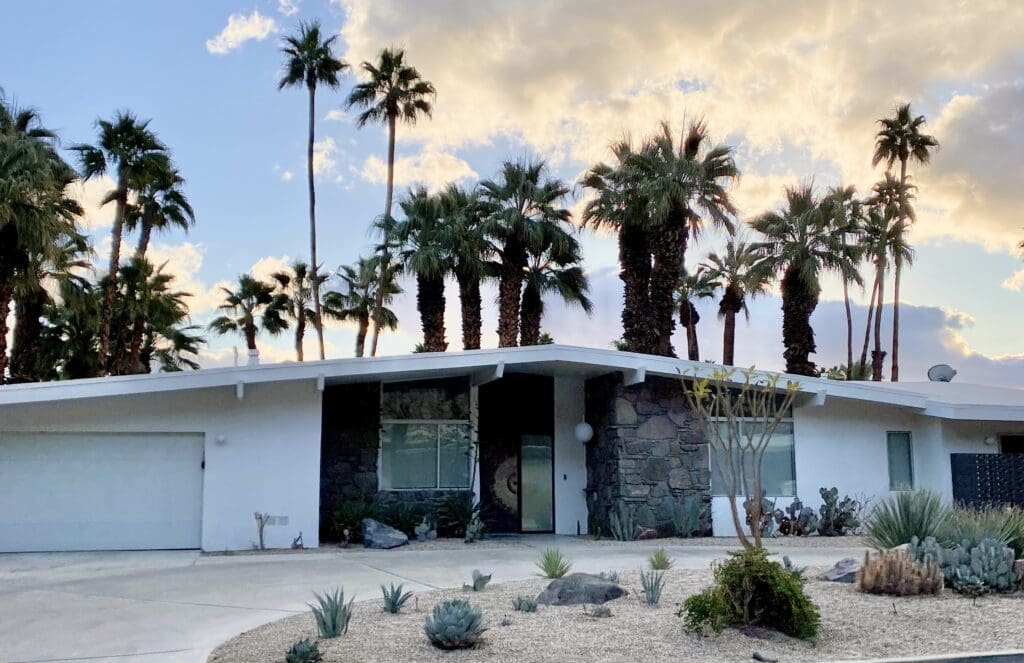 Mid-century modern house, palm trees.