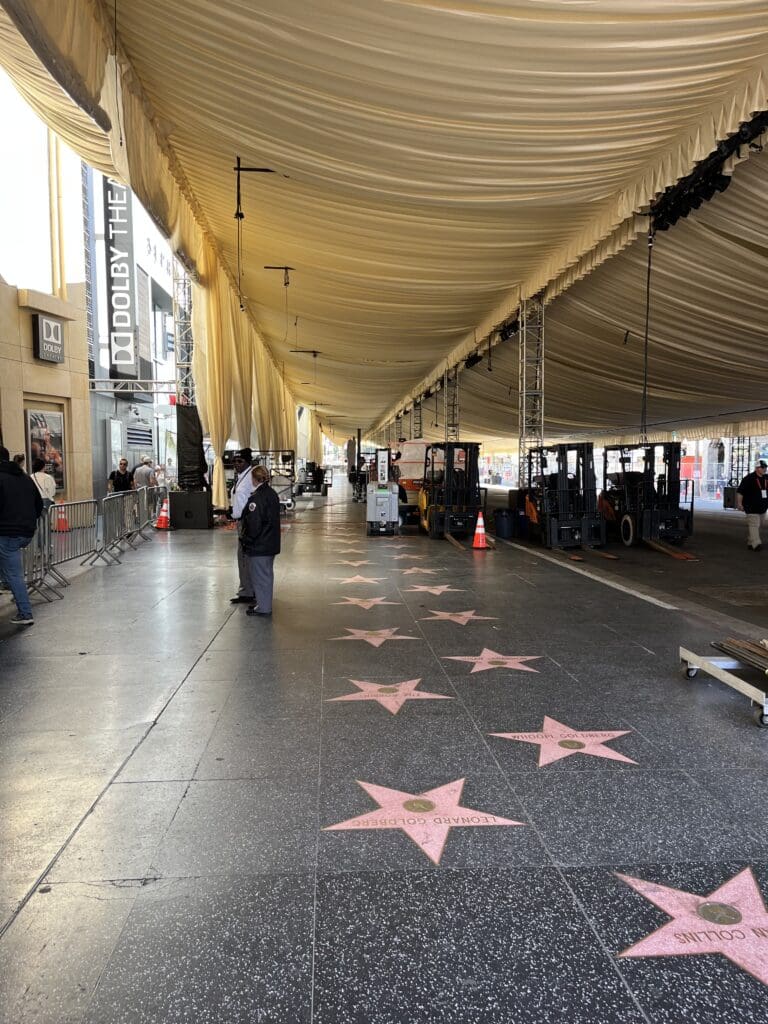 Hollywood Walk of Fame stars under tent canopy