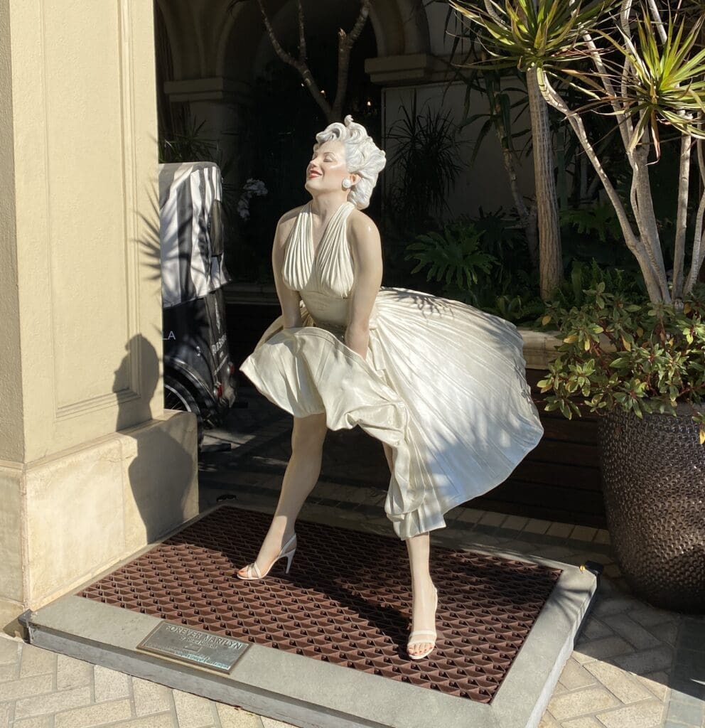 Woman in white dress over vent grate