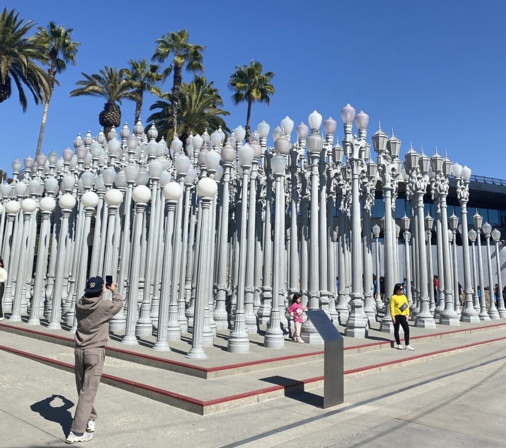 Urban Light lamp post installation with visitors