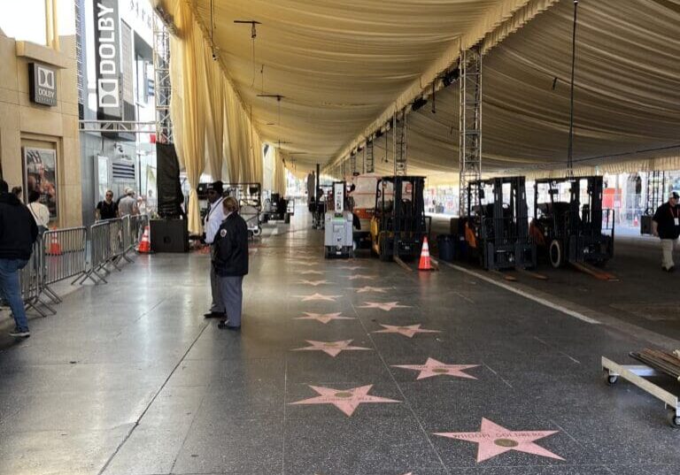 Hollywood Walk of Fame stars under tent canopy