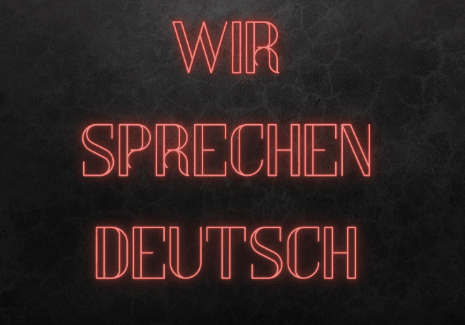Neon sign: We speak German.
