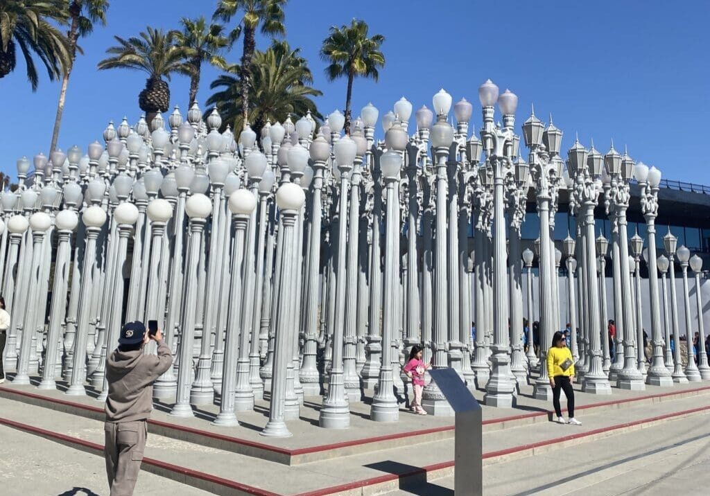 Urban Light lamp post installation with visitors